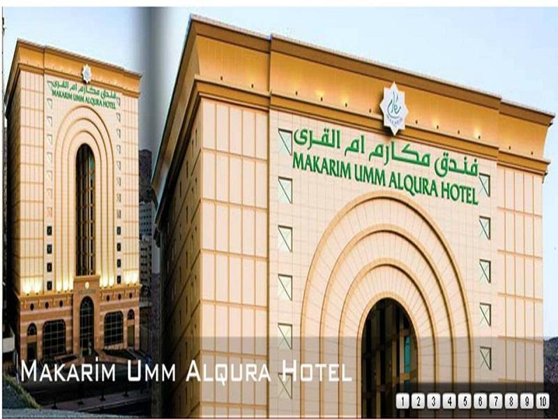 Makarem Umm Al Qura Hotel Mecca Exterior foto The image shows the exterior of the Makarim Umm Alqura Hotel, which features a distinctive architectural design. The building has a large, arched entrance and is adorned with a combination of light and darker colored materials. The hotel's name is pr